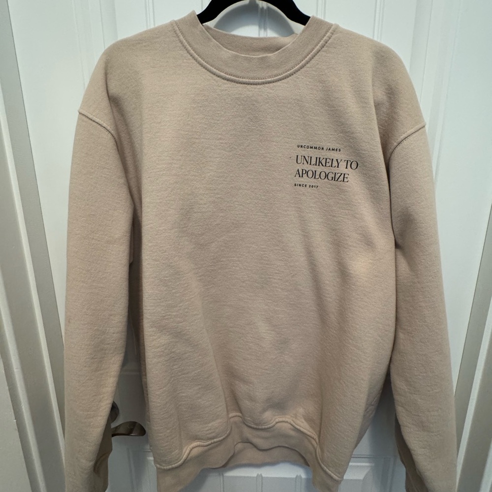 Uncommon James- “Unlikely to Apologize” Beige Crewneck Sweater